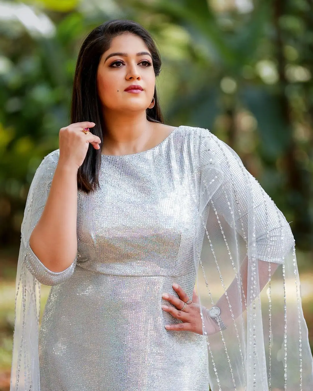 Actress Meghana Raj Stills in Beautiful White Gown